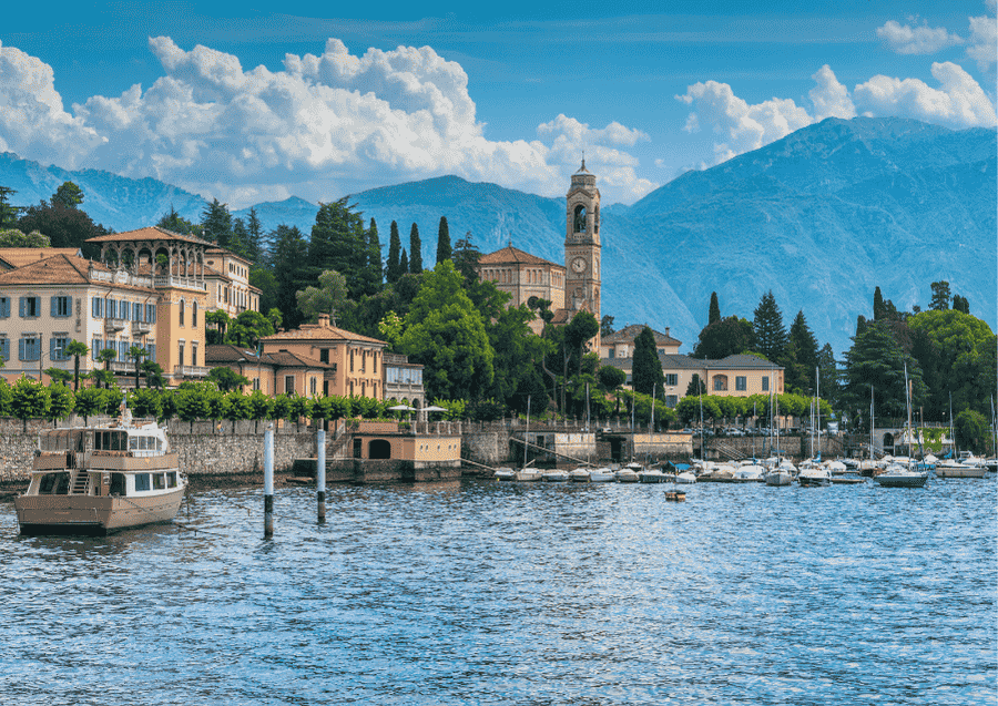 Lake Como, Italy from the water with boats and mountains 